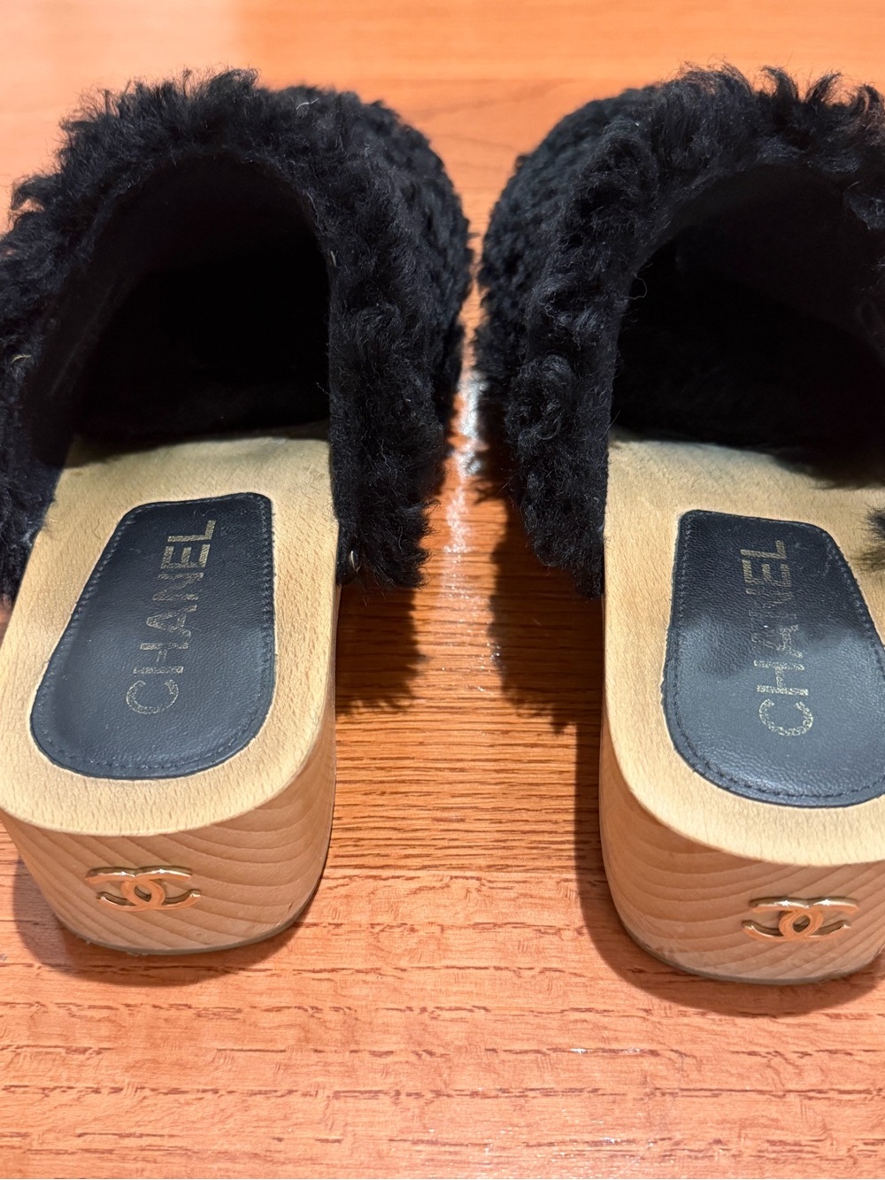 CHANEL Black Faux-Shearling Slide Clogs with Gold CC Accent